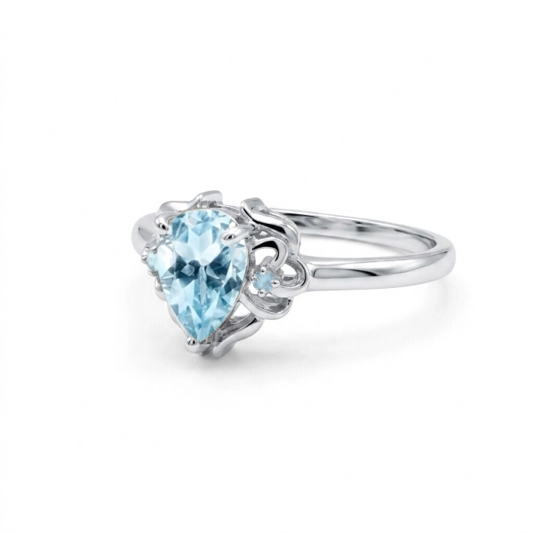 Pierścionek srebrny z topazami 8×5 mm i 2 mm – Błękitny Blask